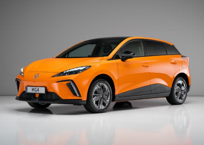 An orange and black car
Description automatically generated